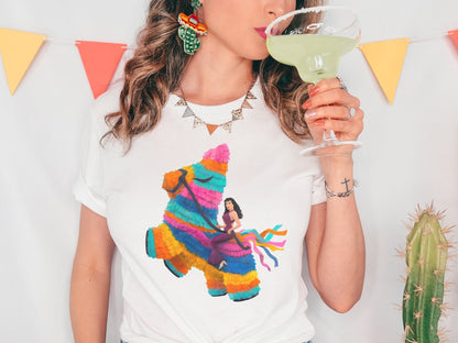 Selena Riding Piñata Unisex t-shirt - Marissa Joyner Studio